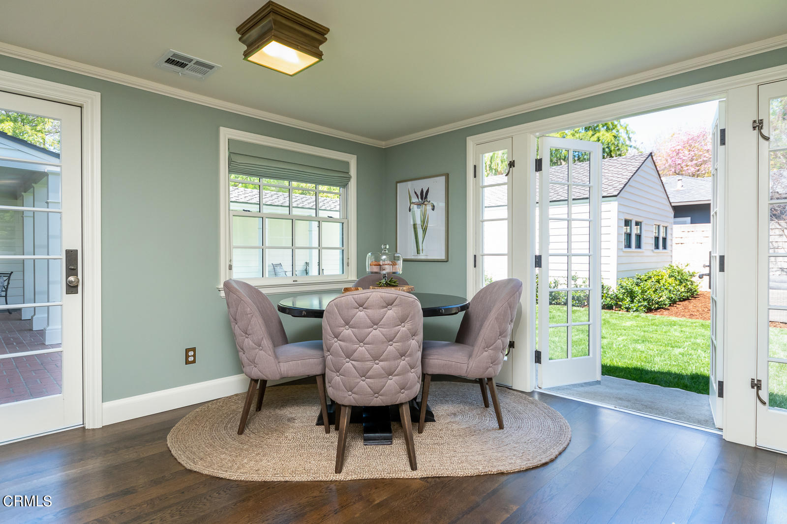 1449 Lida Street Pasadena, CA 91103 - Photo 12 of 35 a view of a dining room with furniture window and wooden floor