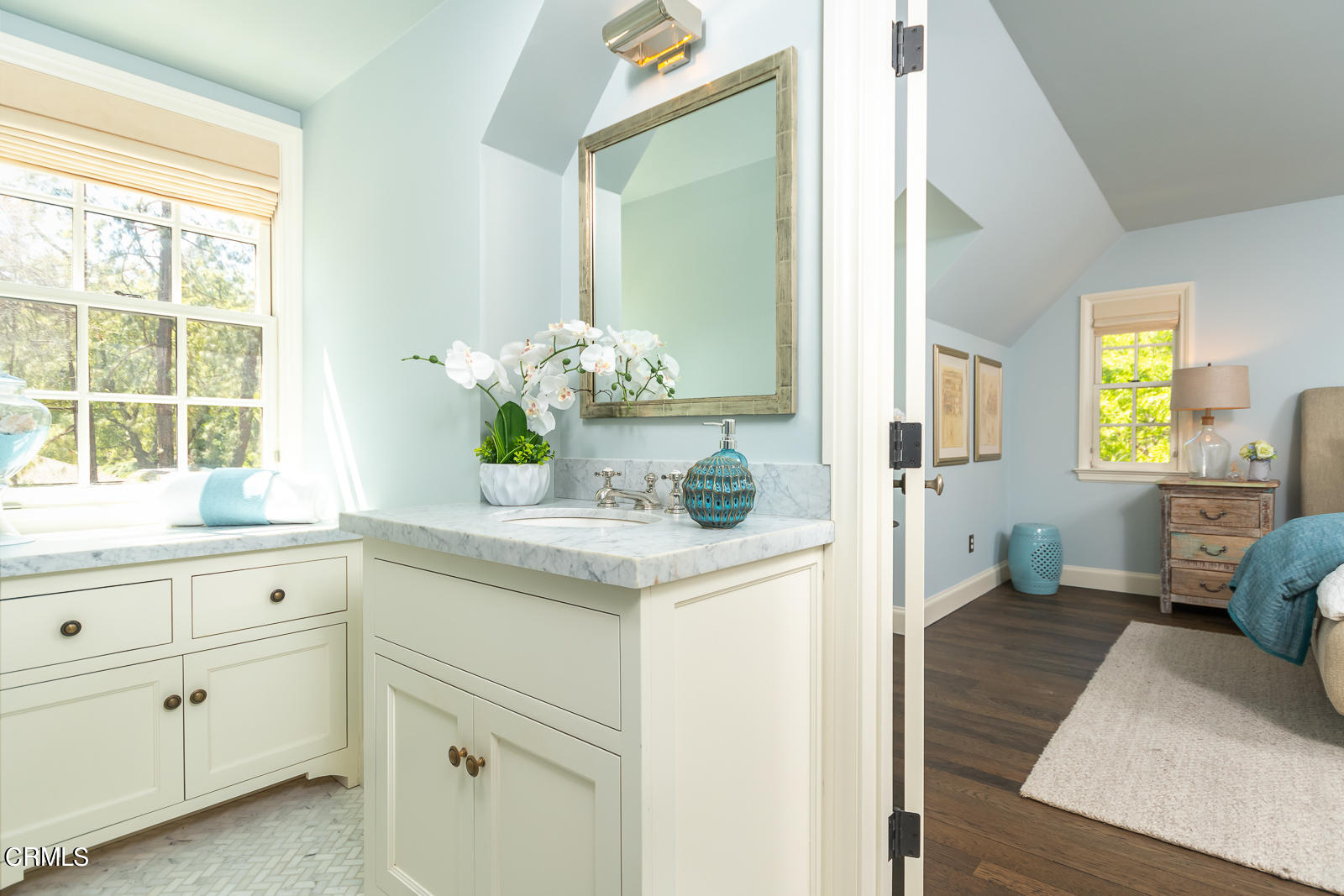 1449 Lida Street Pasadena, CA 91103 - Photo 16 of 35 a kitchen with white cabinets and wooden floor