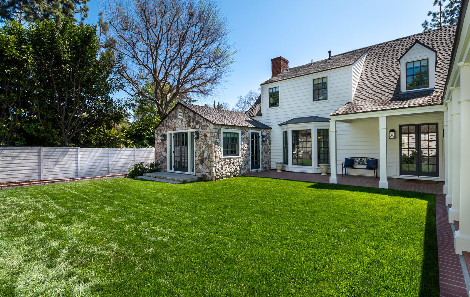 1449 Lida Street Pasadena, CA 91103 - Photo 24 of 35 a view of a house with a yard and porch
