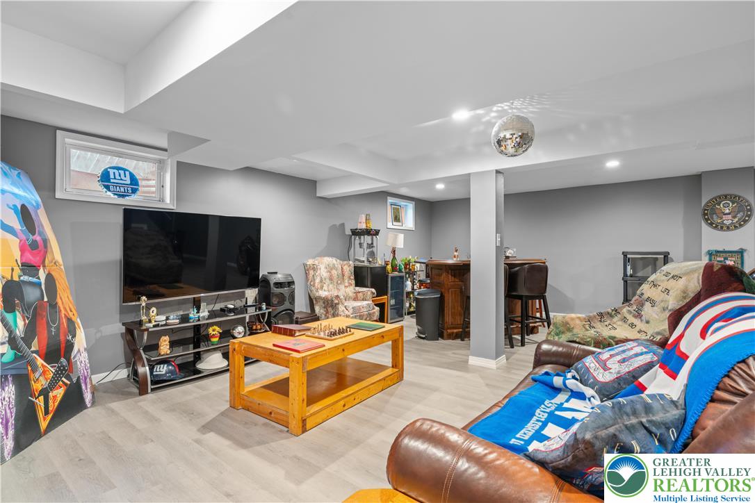 2702 Northampton Street Bethlehem, PA 18020 - Photo 39 of 51 a living room with furniture and a flat screen tv