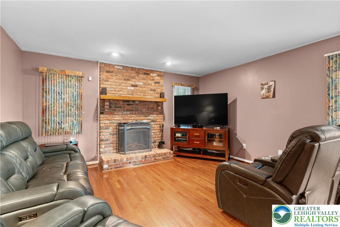 2702 Northampton Street Bethlehem, PA 18020 - Photo 9 of 51 a living room with furniture and a flat screen tv