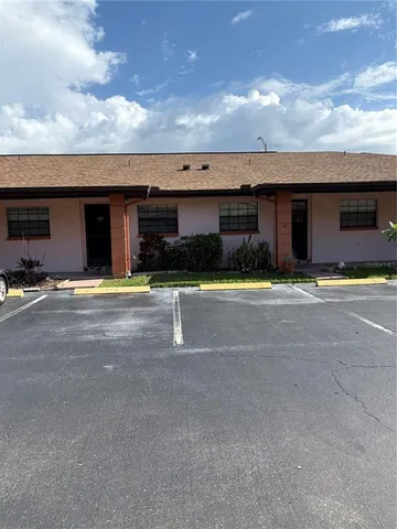 a view of swimming pool with outdoor seating