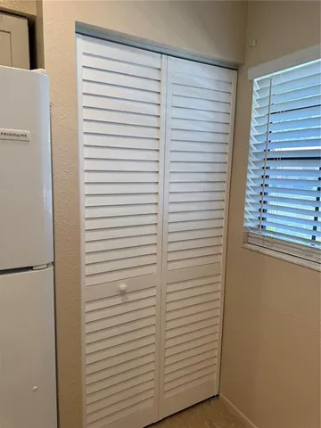 a view of a room with windows