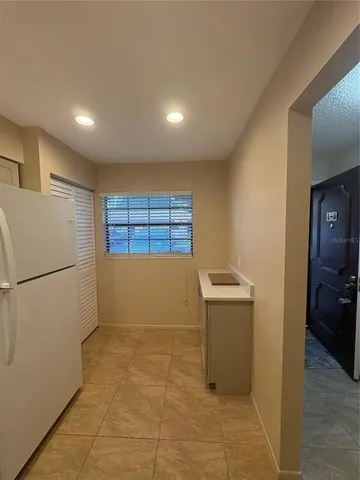 a view of a kitchen with a sink