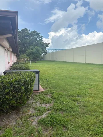 a view of a garden with an outdoor space