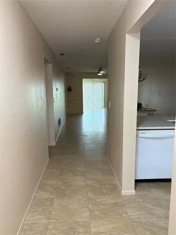 a view of a hallway with entryway