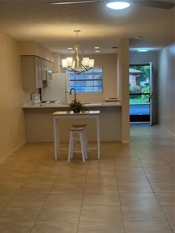 a kitchen with a sink a counter space and appliances