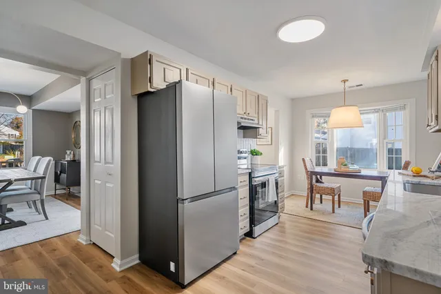 a bathroom with a sink double vanity and a mirror