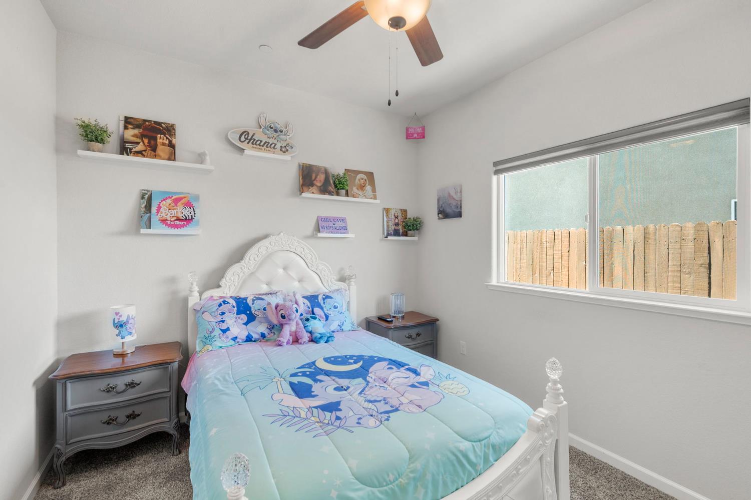 1500 Lahonton Way Ione, CA 95640 - Photo 19 of 52 a bedroom with a bed and a chandelier
