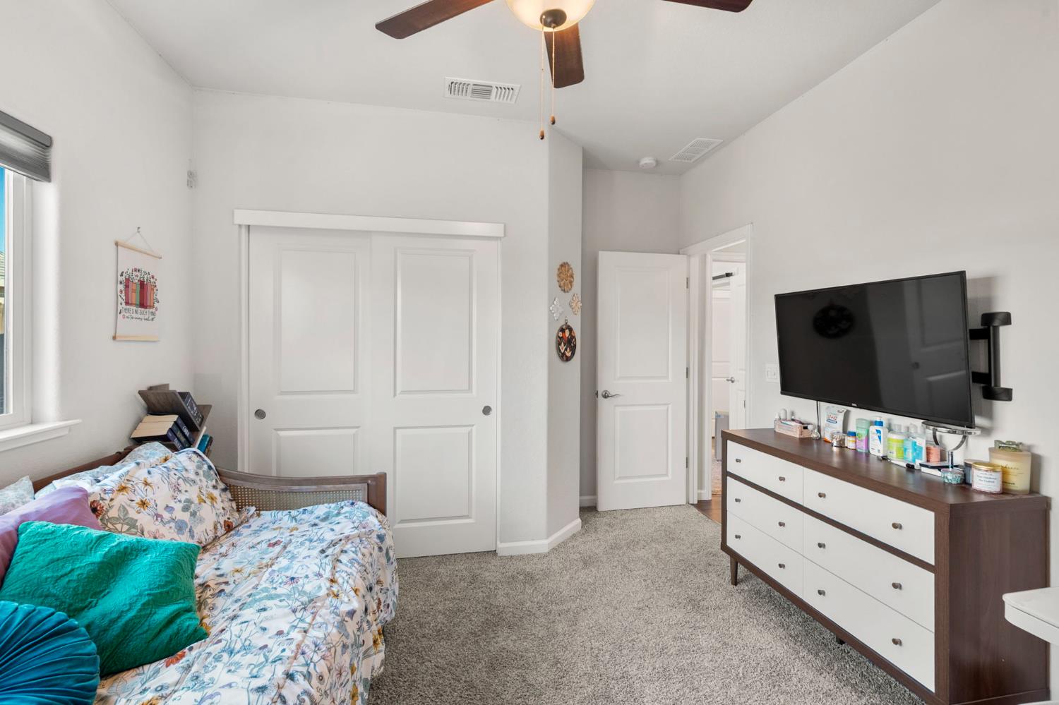 1500 Lahonton Way Ione, CA 95640 - Photo 23 of 52 a bedroom with a bed and flat screen tv