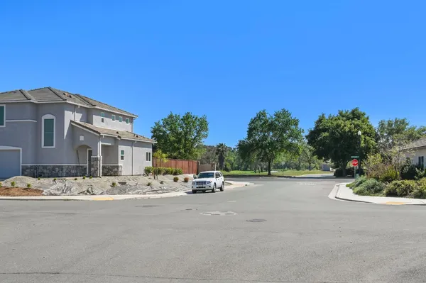 a outdoor space with lots of tables and chairs