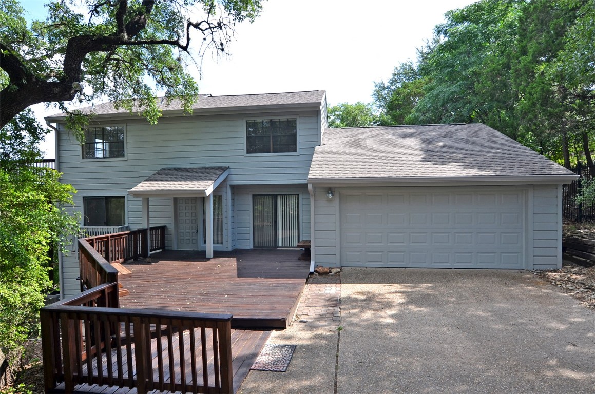 a house with trees in front of it