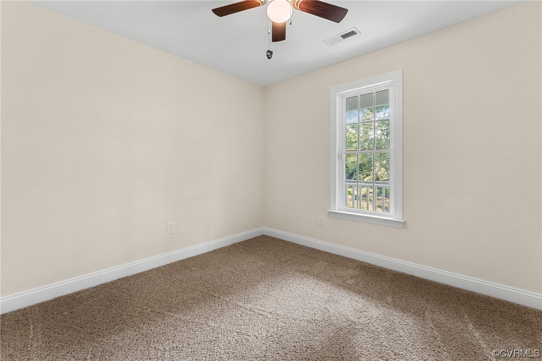 668 East Chinquapin Road King William, VA 23086 - Photo 19 of 21 an empty room with a window