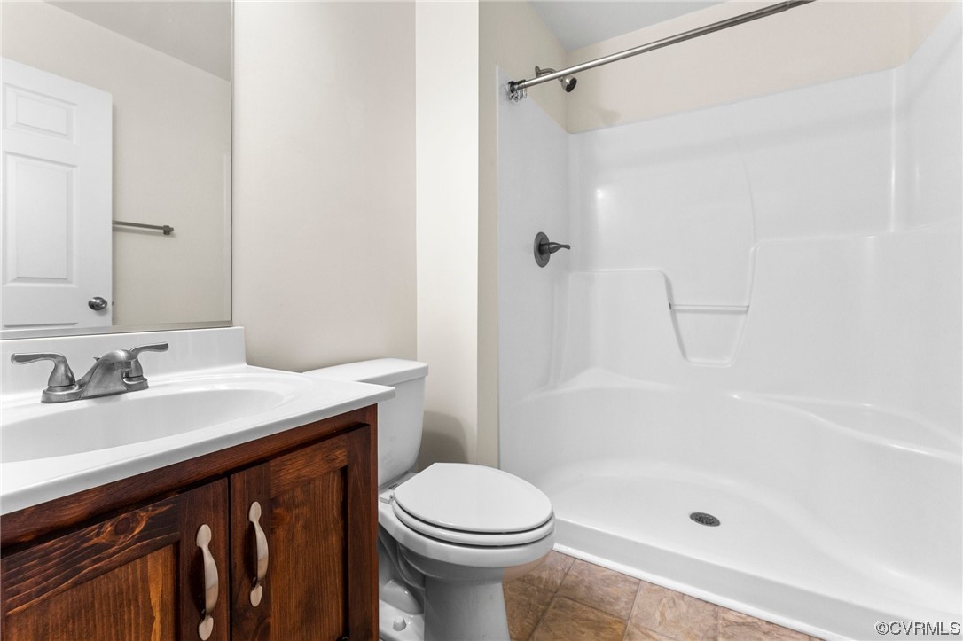 668 East Chinquapin Road King William, VA 23086 - Photo 20 of 21 a bathroom with a sink a toilet and shower