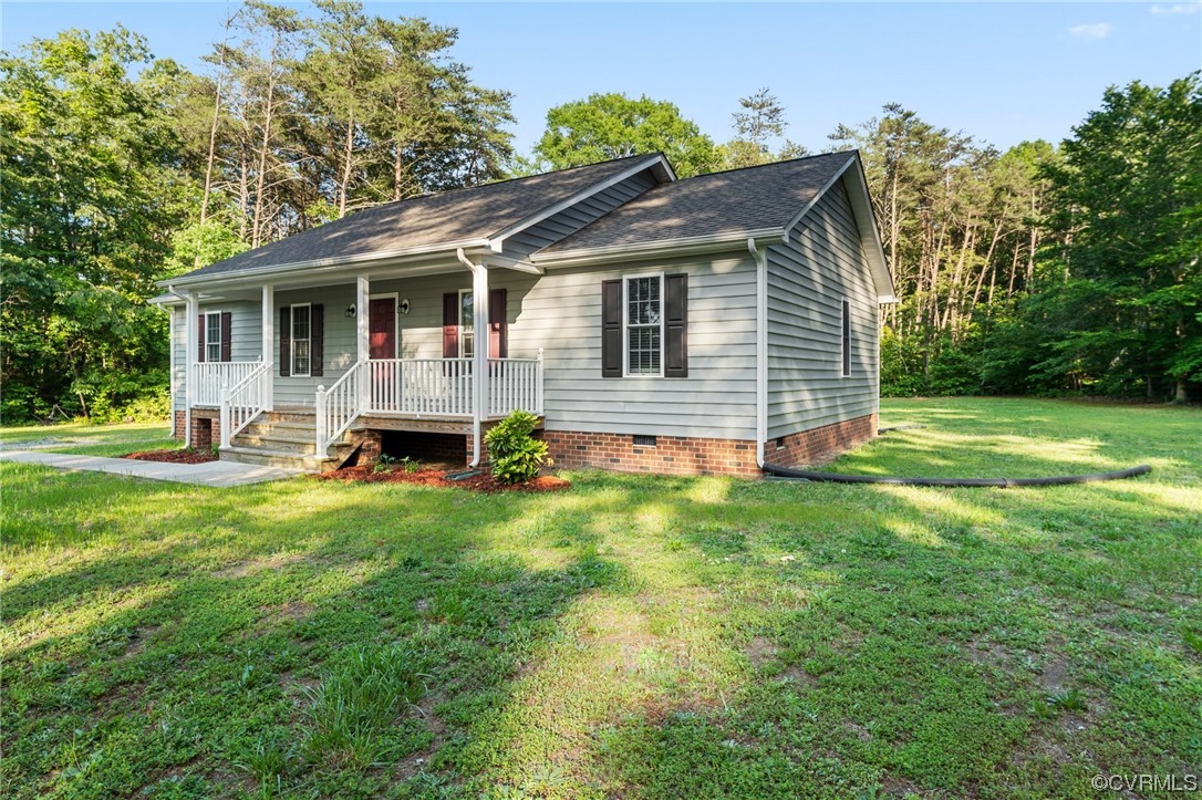 668 East Chinquapin Road King William, VA 23086 - Photo 4 of 21 a front view of house with yard and green space