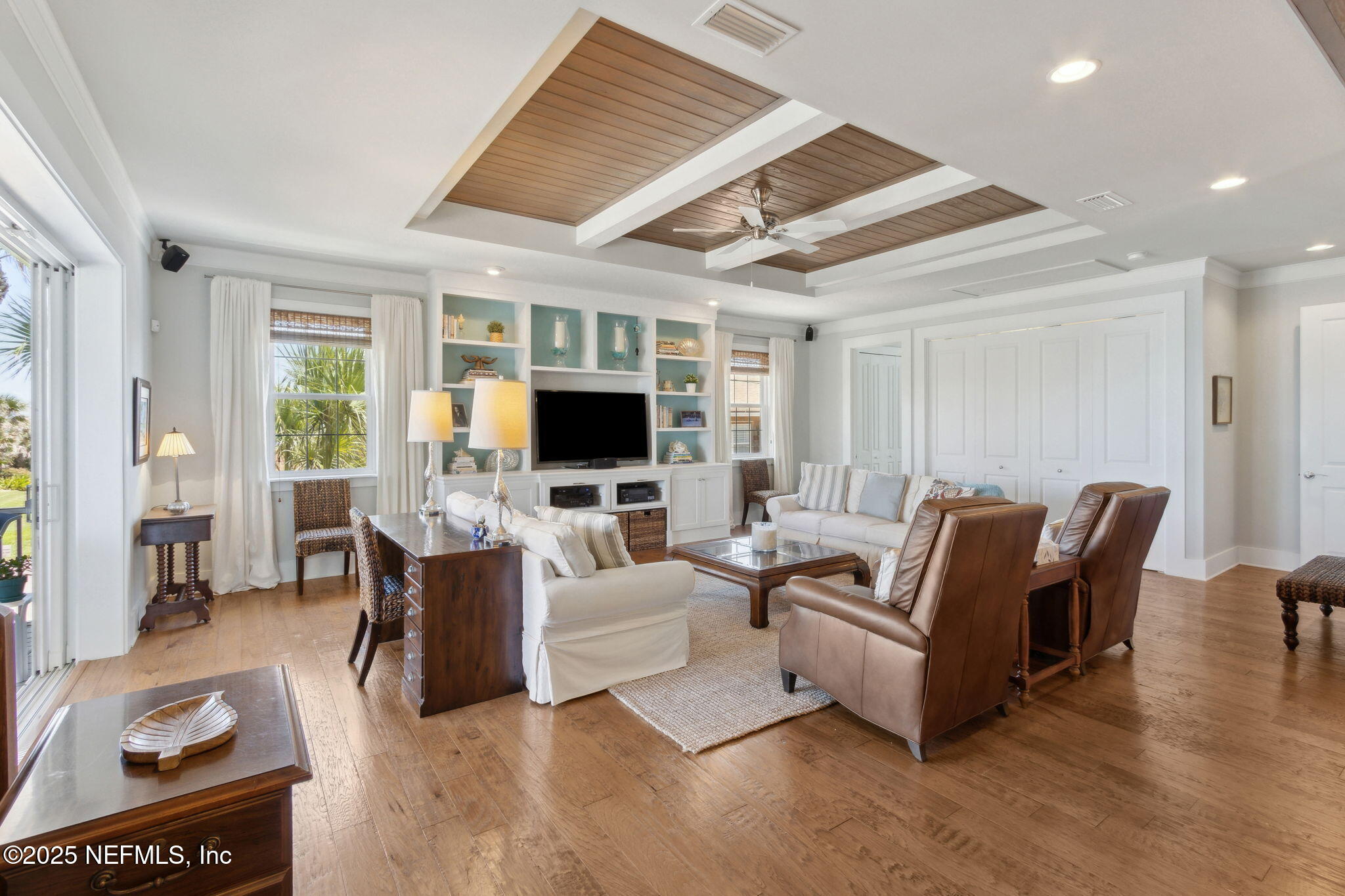 111 Cherry Street Neptune Beach, FL 32266 - Photo 9 of 62 a living room with furniture and a flat screen tv