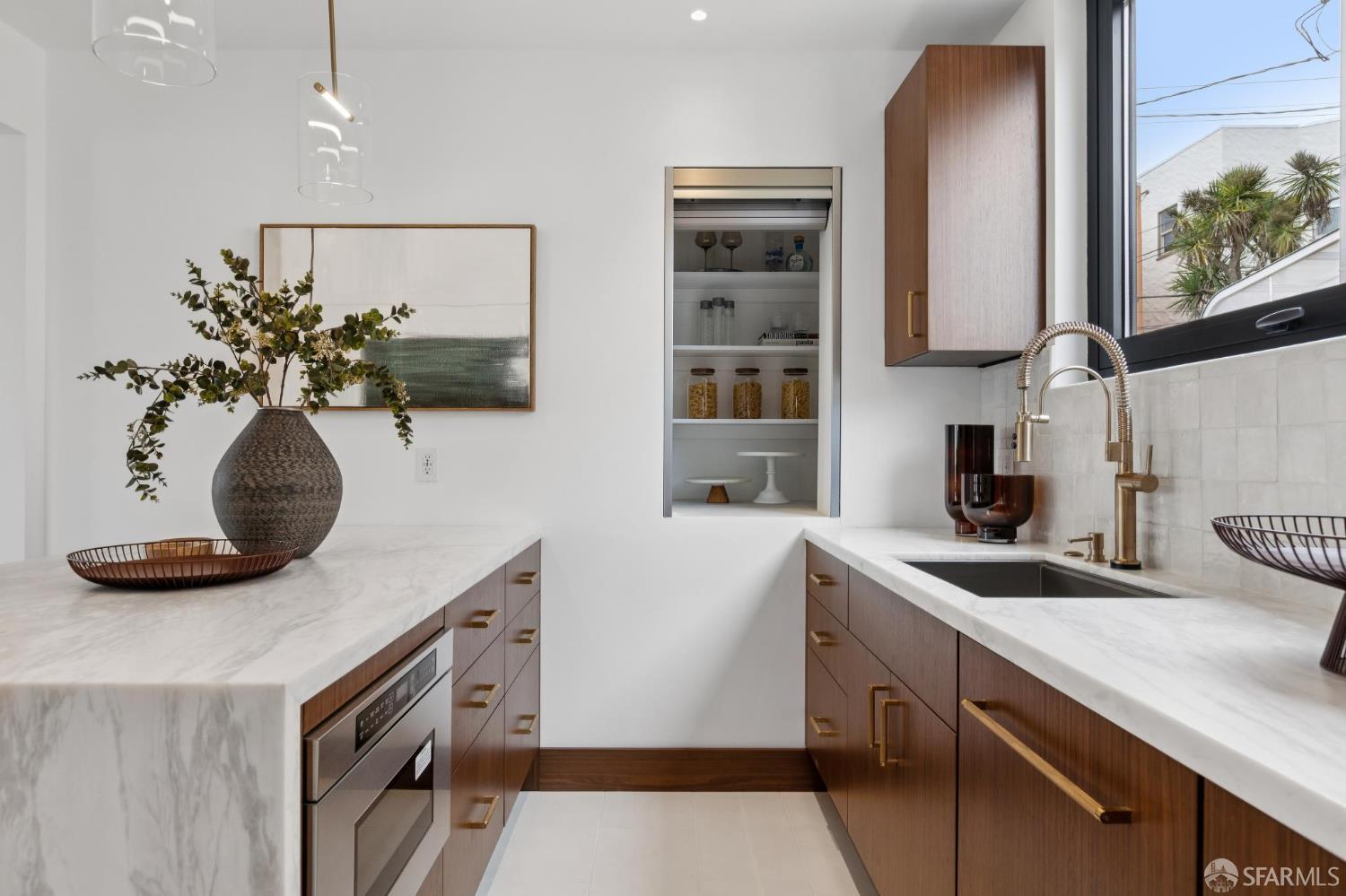 71 Manor Drive San Francisco, CA 94127 - Photo 15 of 51 a kitchen with stainless steel appliances a sink a stove and a microwave