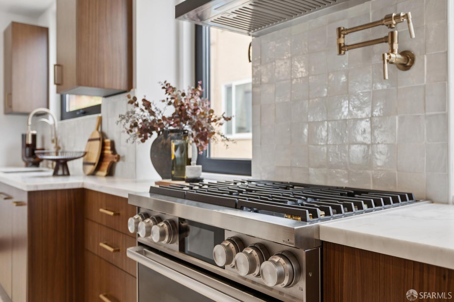 71 Manor Drive San Francisco, CA 94127 - Photo 17 of 51 a kitchen with a stove and a white cabinet