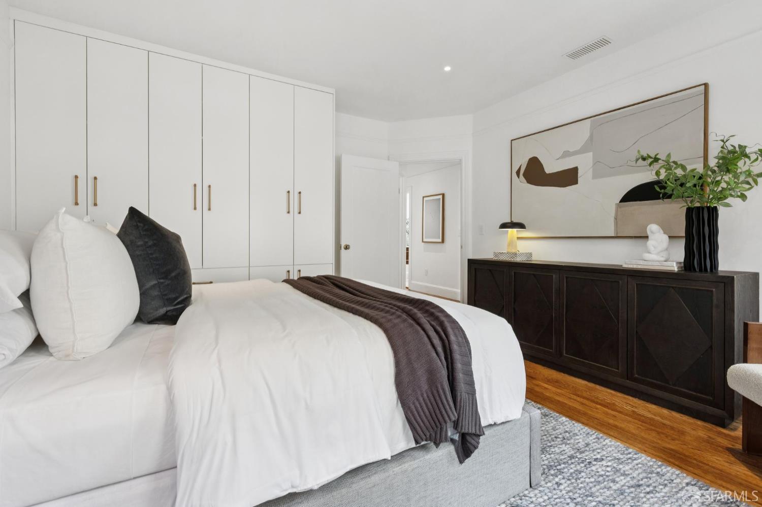 71 Manor Drive San Francisco, CA 94127 - Photo 29 of 51 a bedroom with a bed and a potted plant