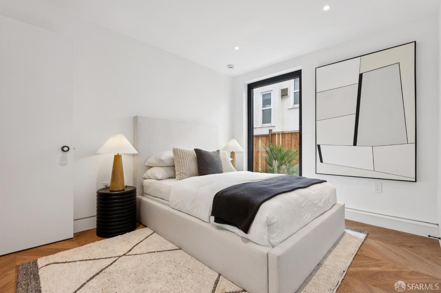 71 Manor Drive San Francisco, CA 94127 - Photo 31 of 51 a bedroom with a large bed and a large window