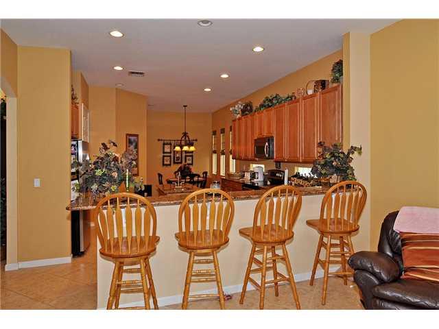3152 Southwest Porpoise Circle Stuart, FL 34997 - Photo 10 of 19 a very nice looking dining room with furniture