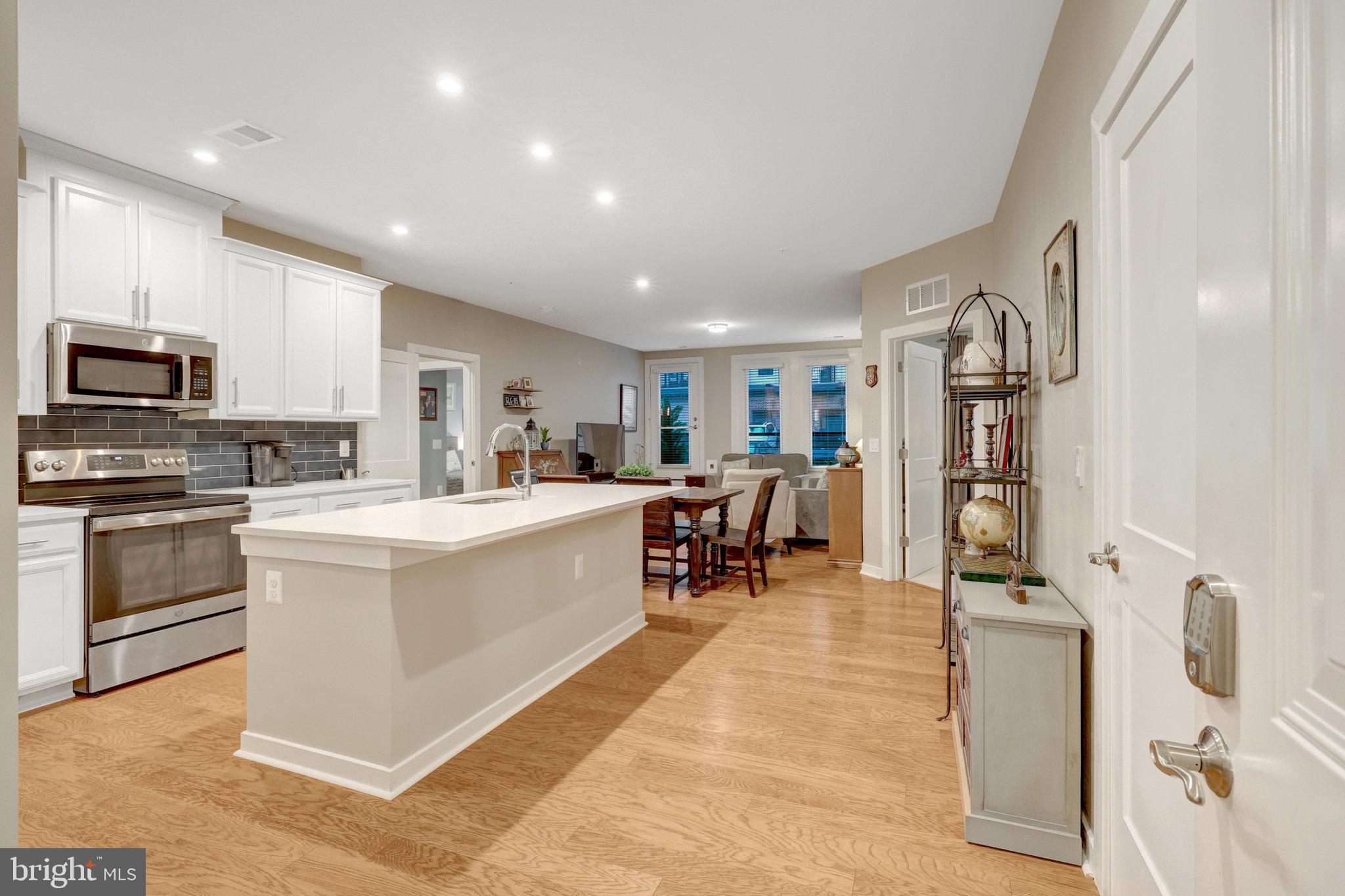 1675 Bandit Loop, Unit 103B Reston, VA 20190 - Photo 6 of 38 Large kitchen island