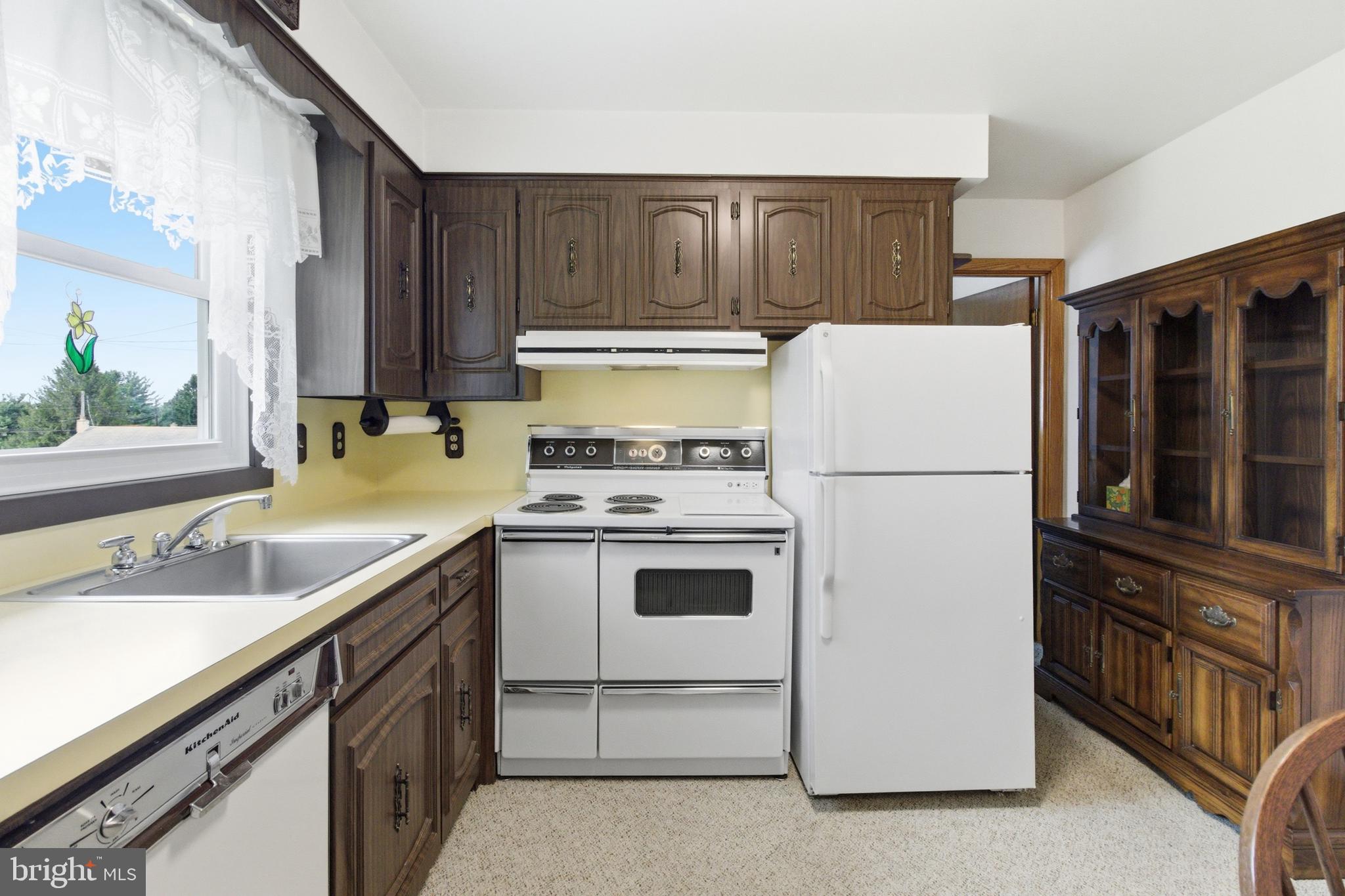 684 Powell Street Hawk Run, PA 16840 - Photo 14 of 35 Kitchen view showing range & refrigerator.