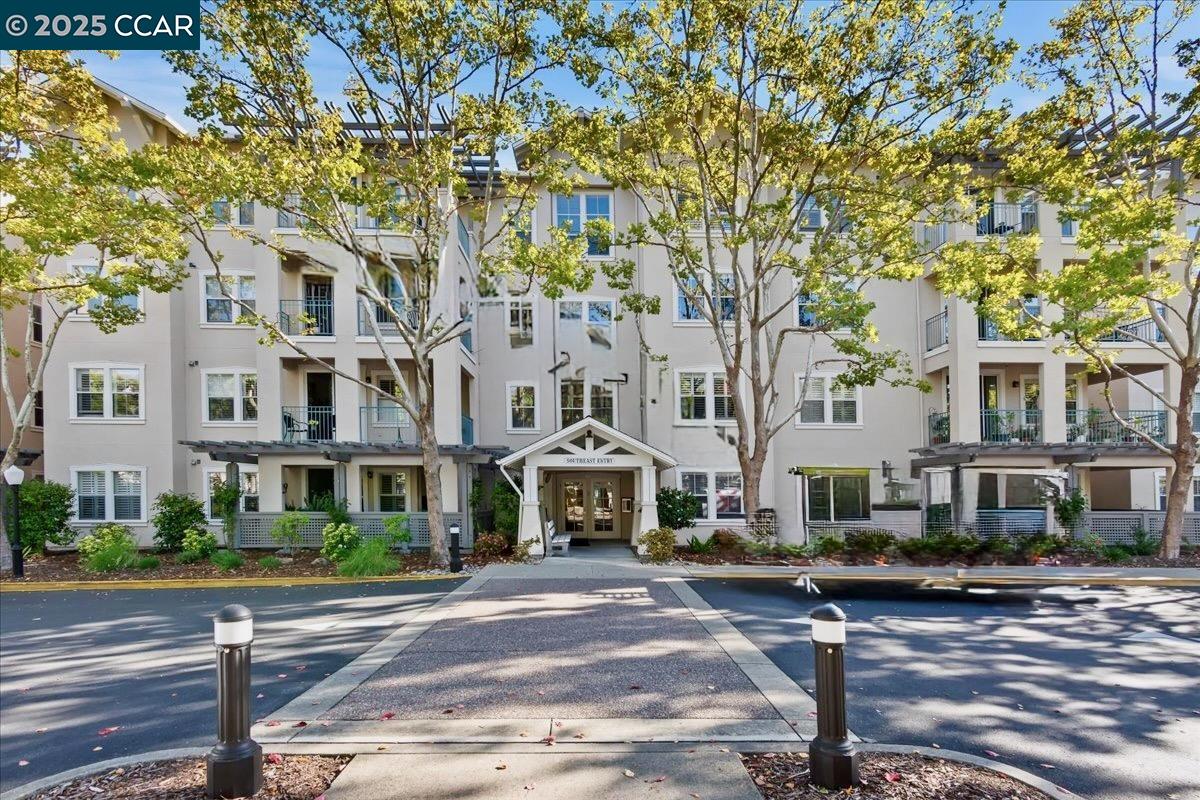 a front view of a building with street view