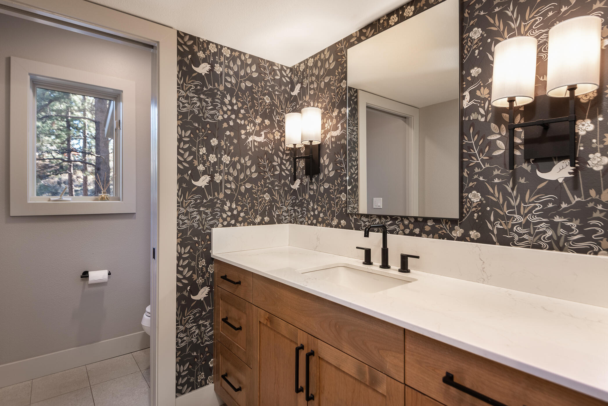 60012 West Ridgeview Drive Bend, OR 97702 - Photo 28 of 55 a bathroom with a sink and a mirror