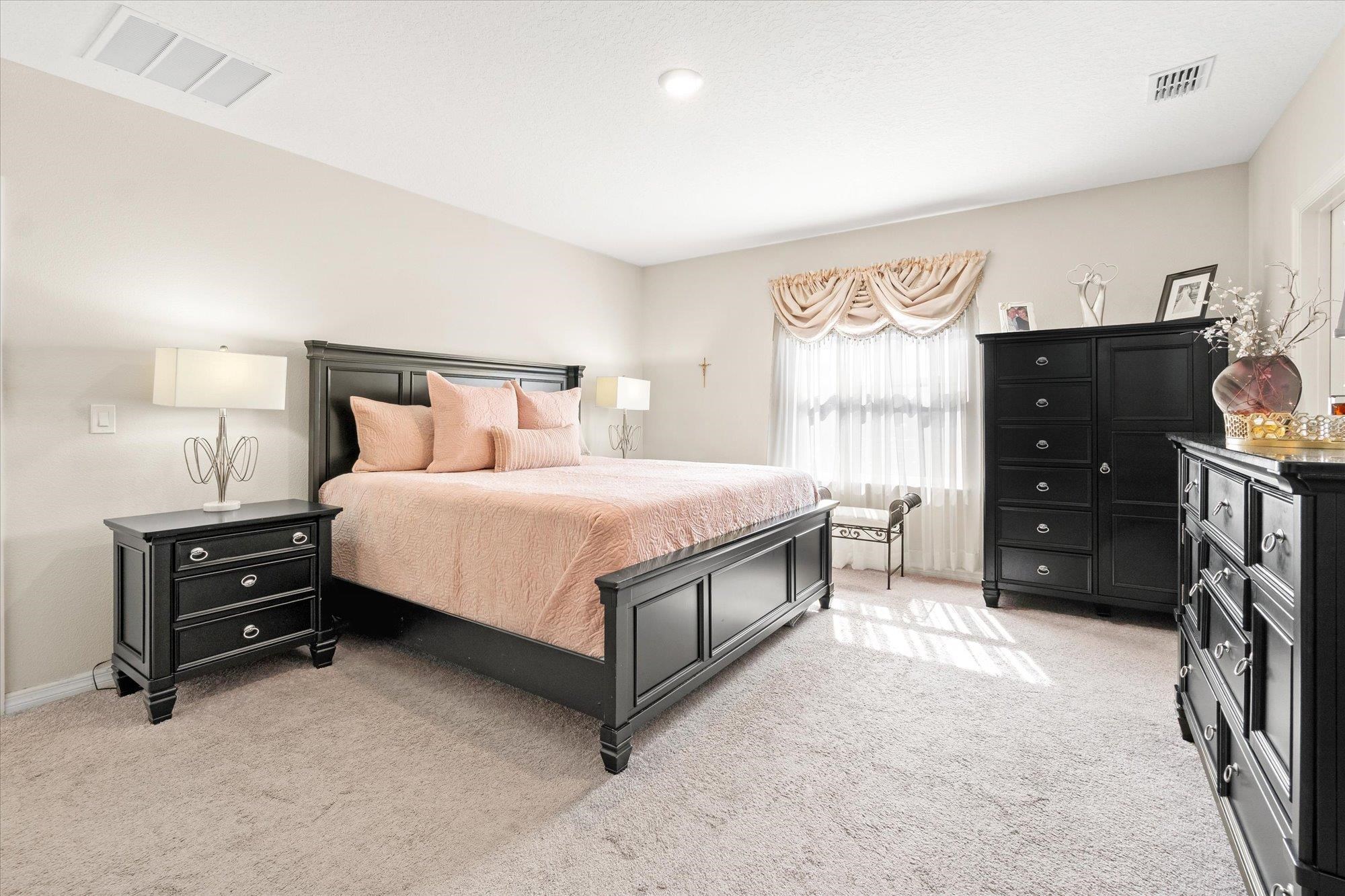 1 Frenora Lane Palm Coast, FL 32137 - Photo 12 of 43 Bedroom with light colored carpet