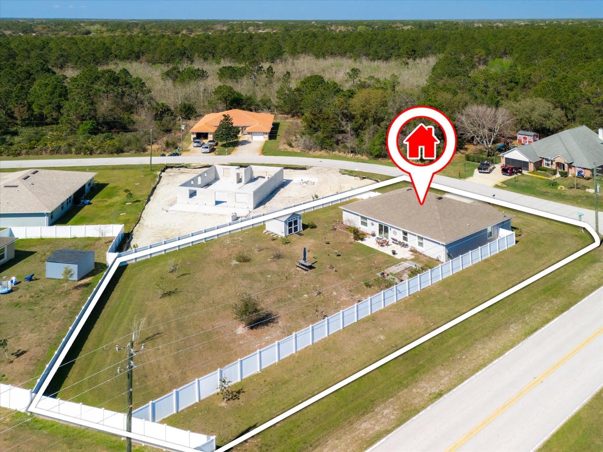 1 Frenora Lane Palm Coast, FL 32137 - Photo 2 of 43 Drone / aerial view of a forest