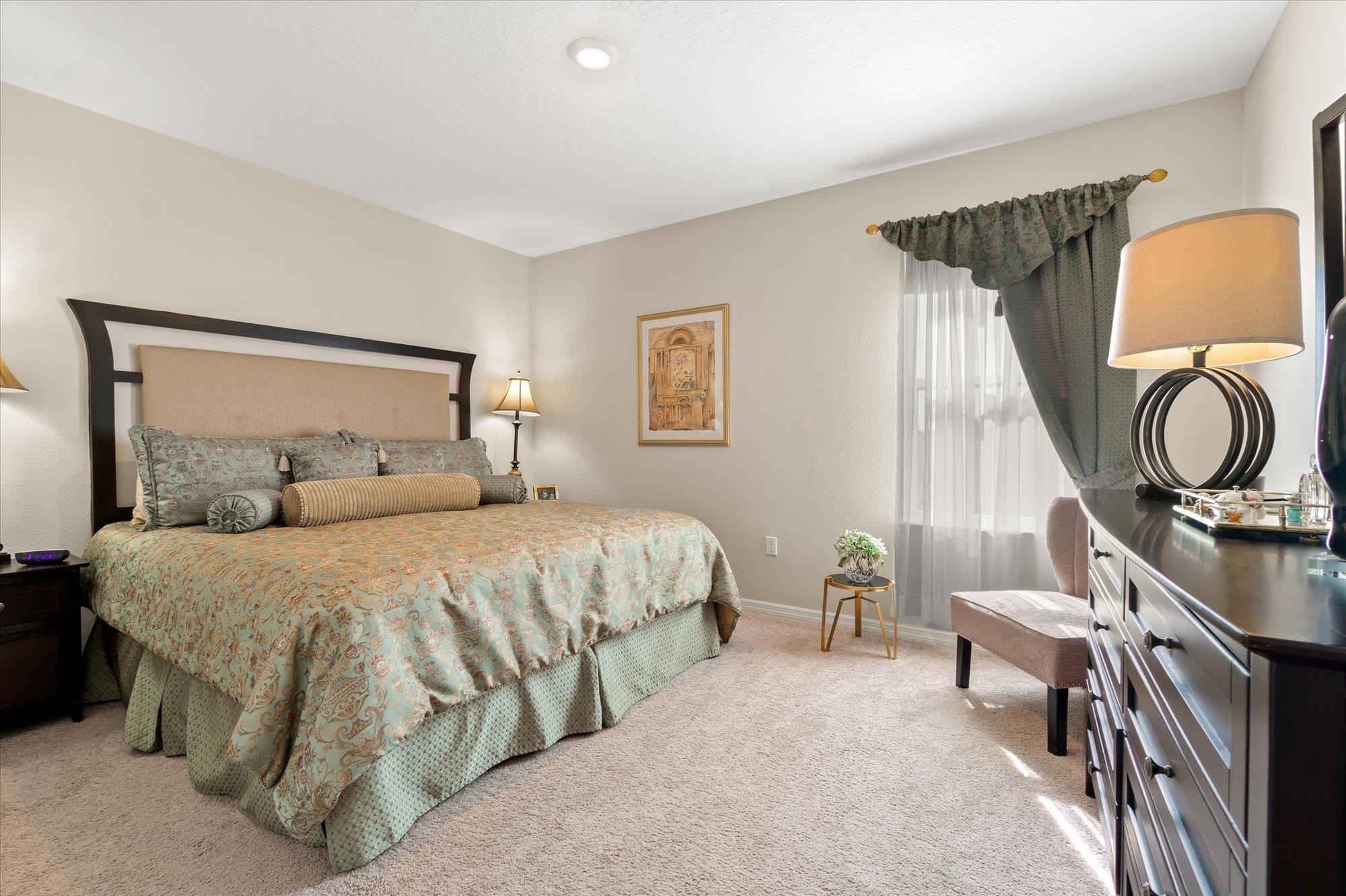 1 Frenora Lane Palm Coast, FL 32137 - Photo 20 of 43 Bedroom featuring baseboards and light carpet