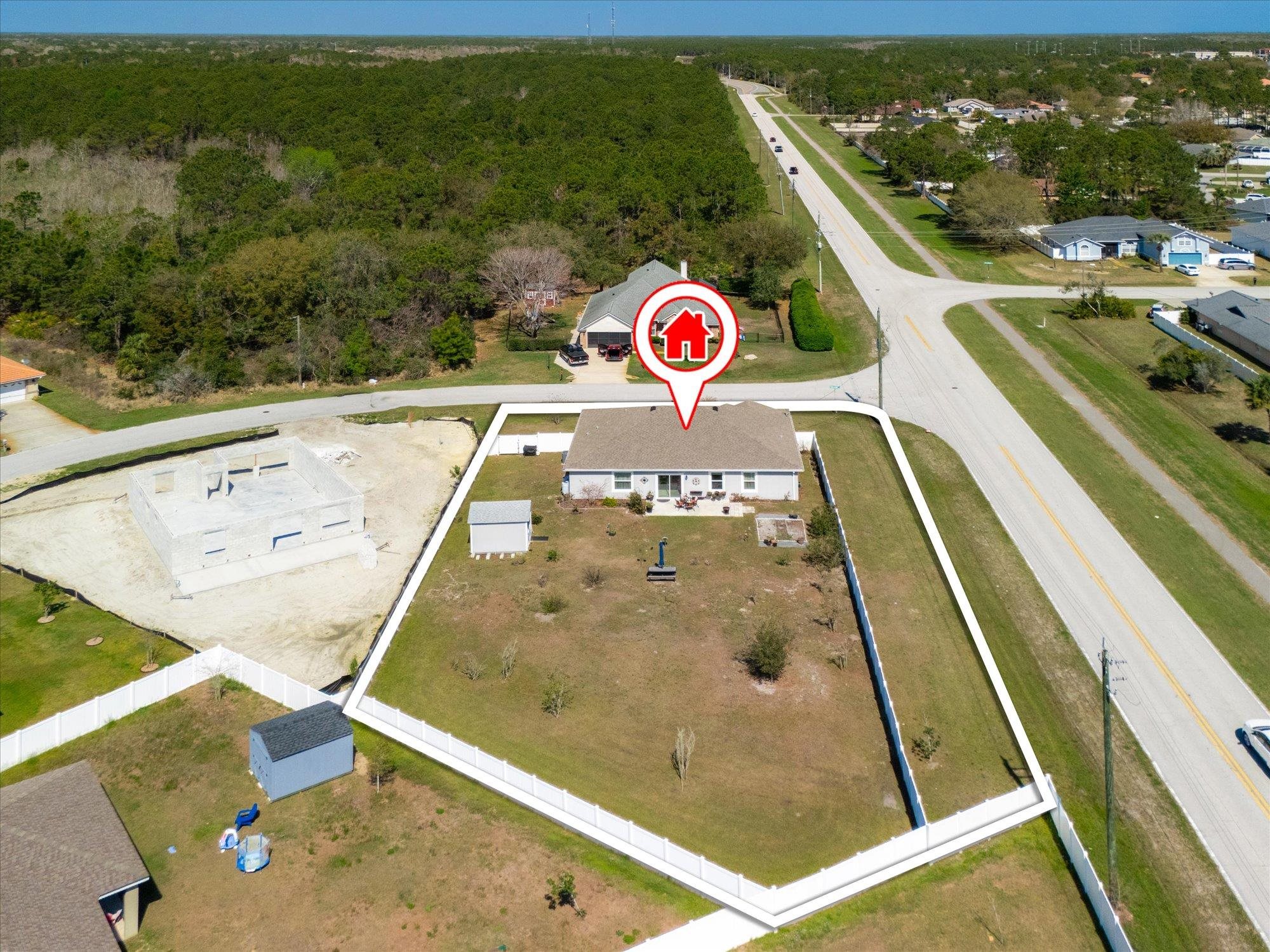 1 Frenora Lane Palm Coast, FL 32137 - Photo 38 of 43 Drone / aerial view of a heavily wooded area