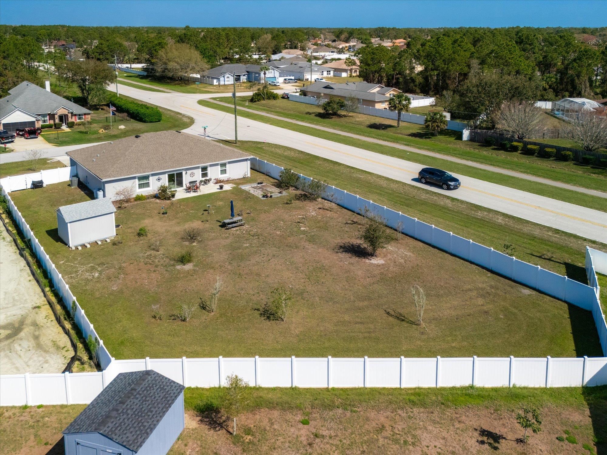 1 Frenora Lane Palm Coast, FL 32137 - Photo 39 of 43 Aerial perspective of suburban area