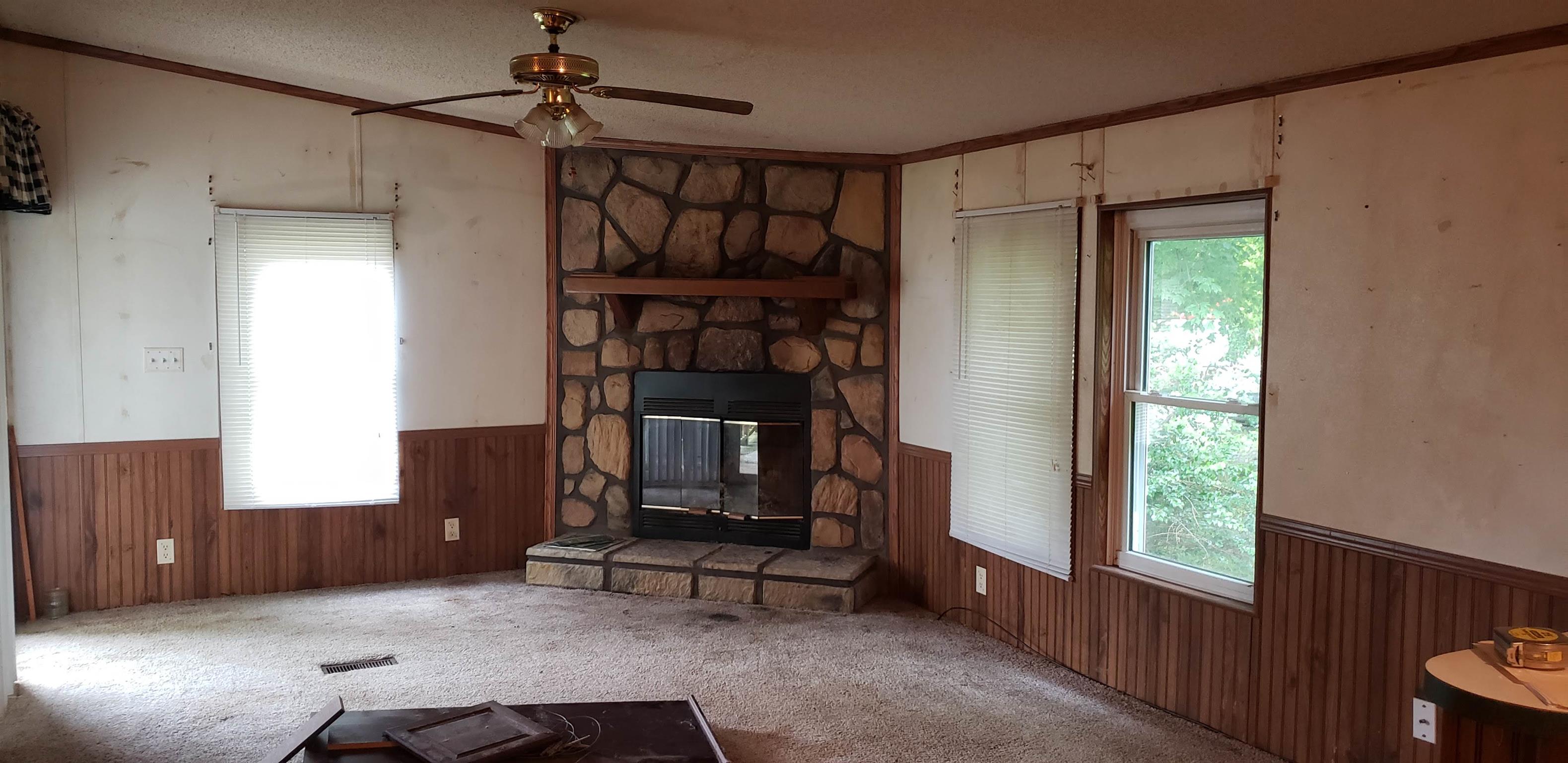 39 Bluff Road St. Joseph, TN 38481 - Photo 4 of 7 Wood burning fireplace in family room
