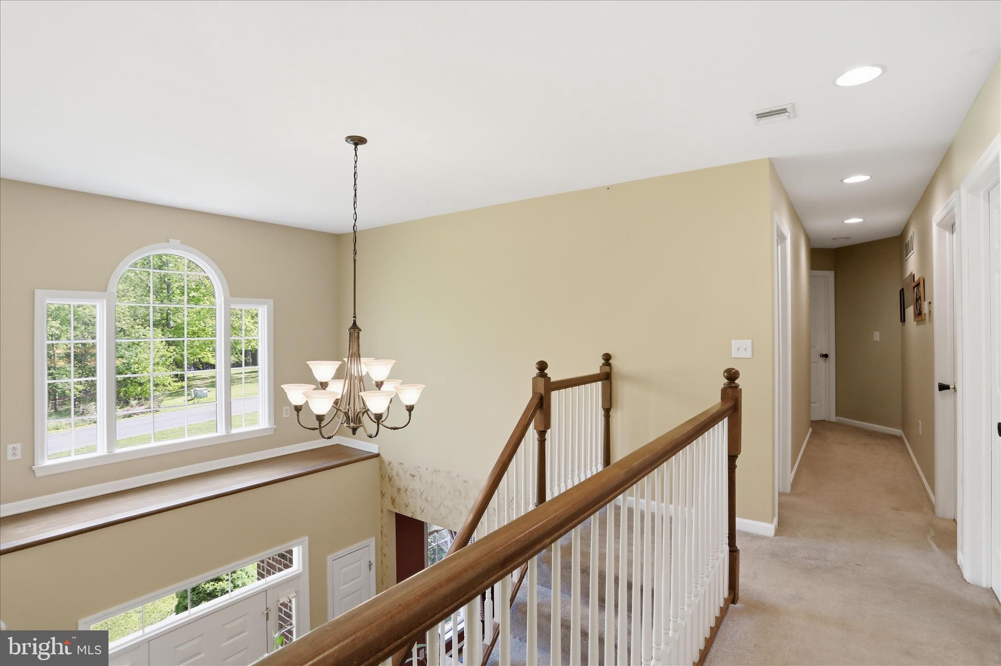 1175 North Lakewood Drive Ridgeley, WV 26753 - Photo 7 of 33 a view of a hallway with a window and chandelier