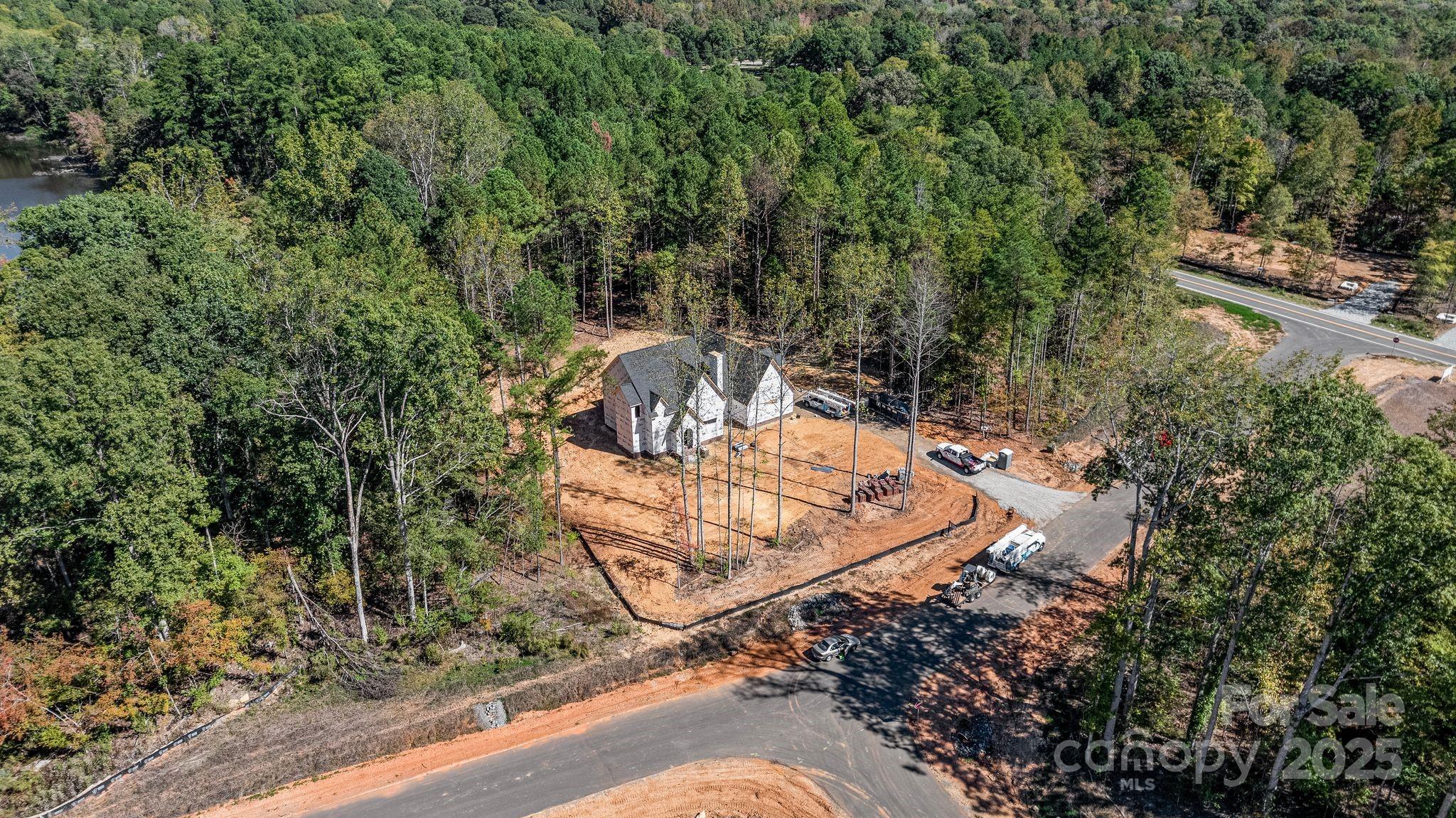 Lot 35 Snow Goose Walk Clover, SC 29710 - Photo 5 of 13 a view of a backyard with wooden fence