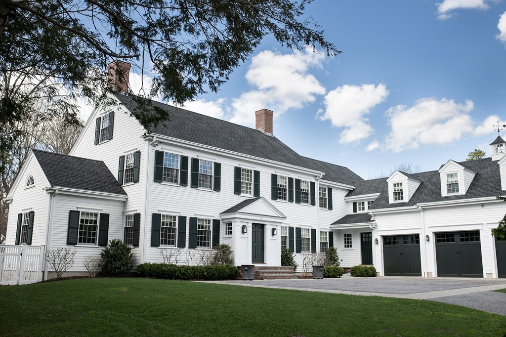 183 Lowell Road Wellesley, MA 02481 - Photo 2 of 27 a front view of a house with garden and trees