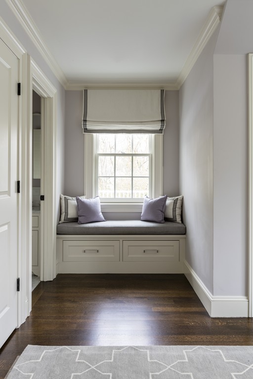 183 Lowell Road Wellesley, MA 02481 - Photo 23 of 27 a living room with a bed furniture and a window
