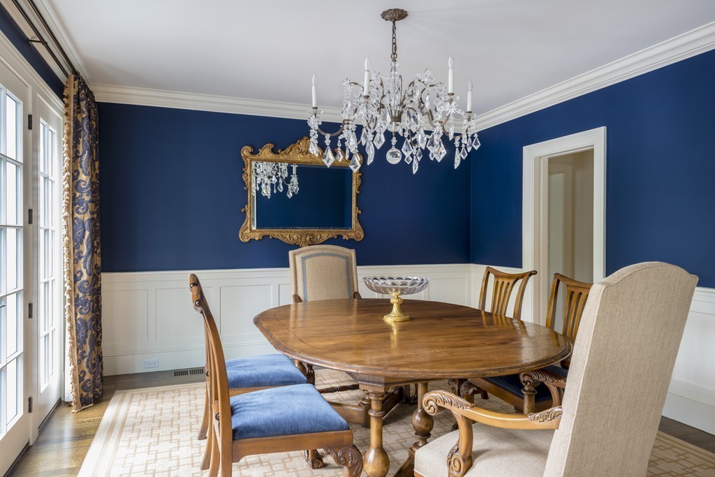 183 Lowell Road Wellesley, MA 02481 - Photo 9 of 27 a view of a dining room with furniture and chandelier