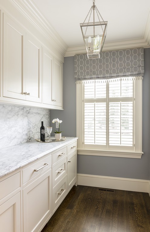 183 Lowell Road Wellesley, MA 02481 - Photo 10 of 27 a kitchen with granite countertop white cabinets and a window