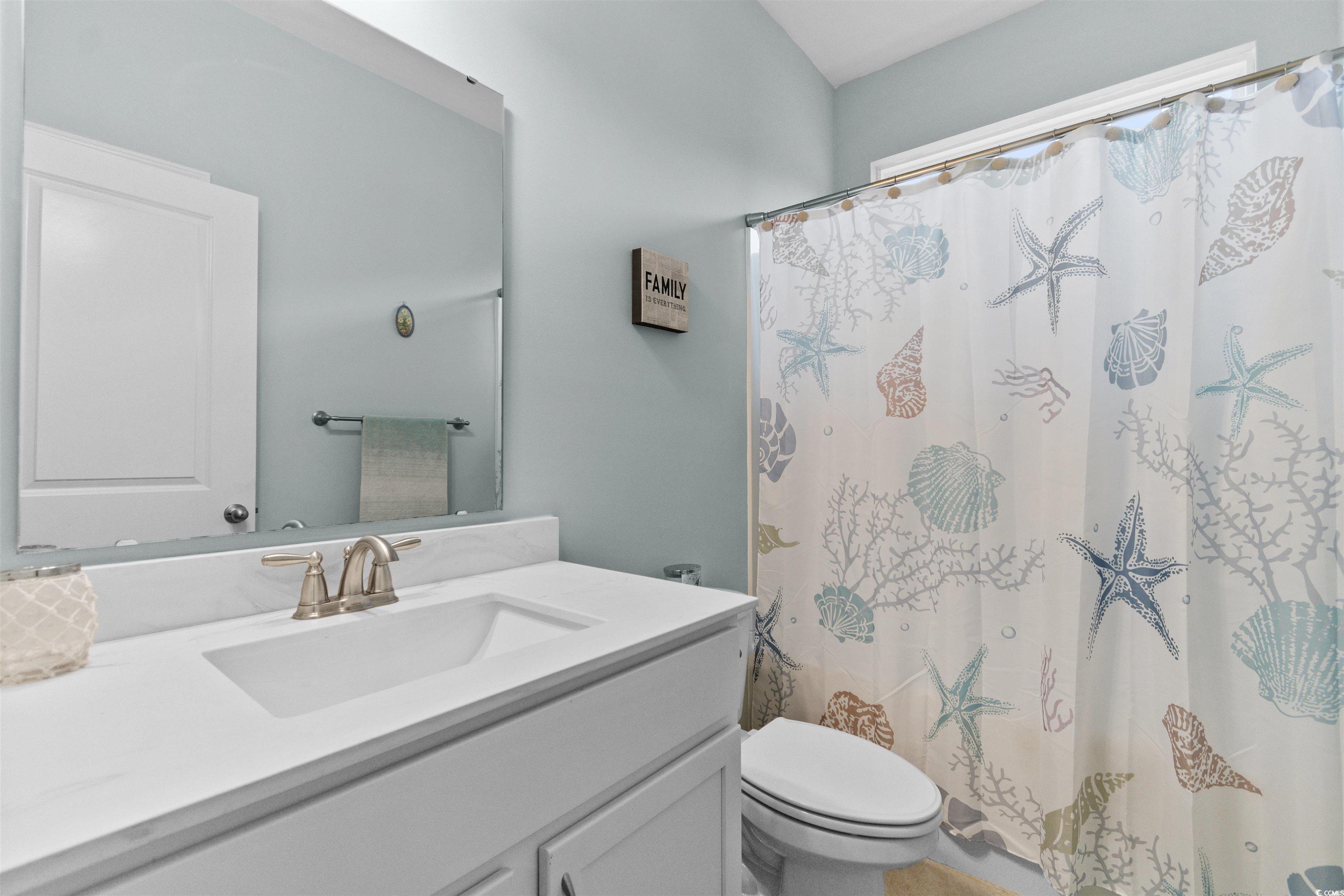 4842 Timberlake Drive Myrtle Beach, SC 29588 - Photo 22 of 38 Full bathroom featuring a shower with curtain and vanity