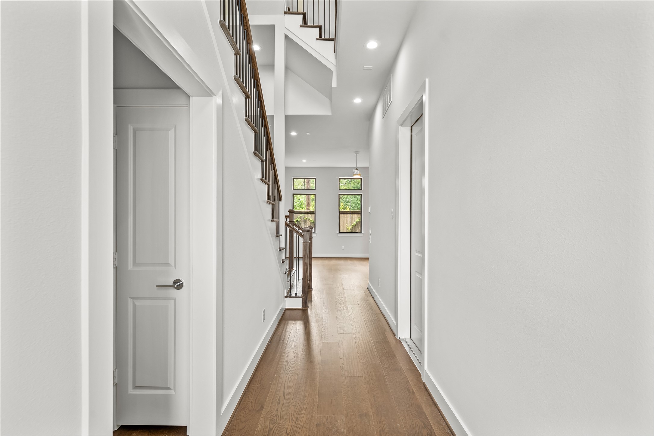 1705 Bologna Lane Houston, TX 77055 - Photo 20 of 43 a view of hallway with wooden floor