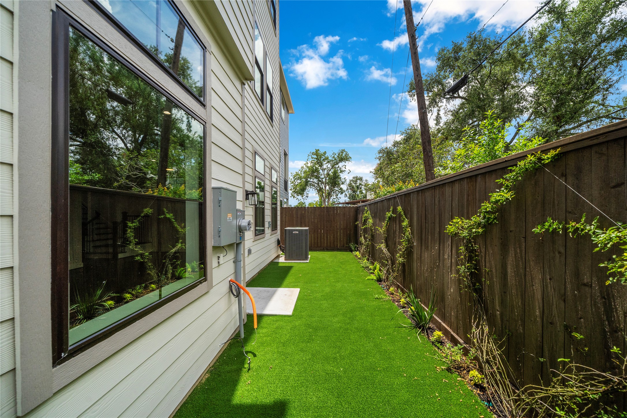 1705 Bologna Lane Houston, TX 77055 - Photo 31 of 43 a view of a door with a backyard