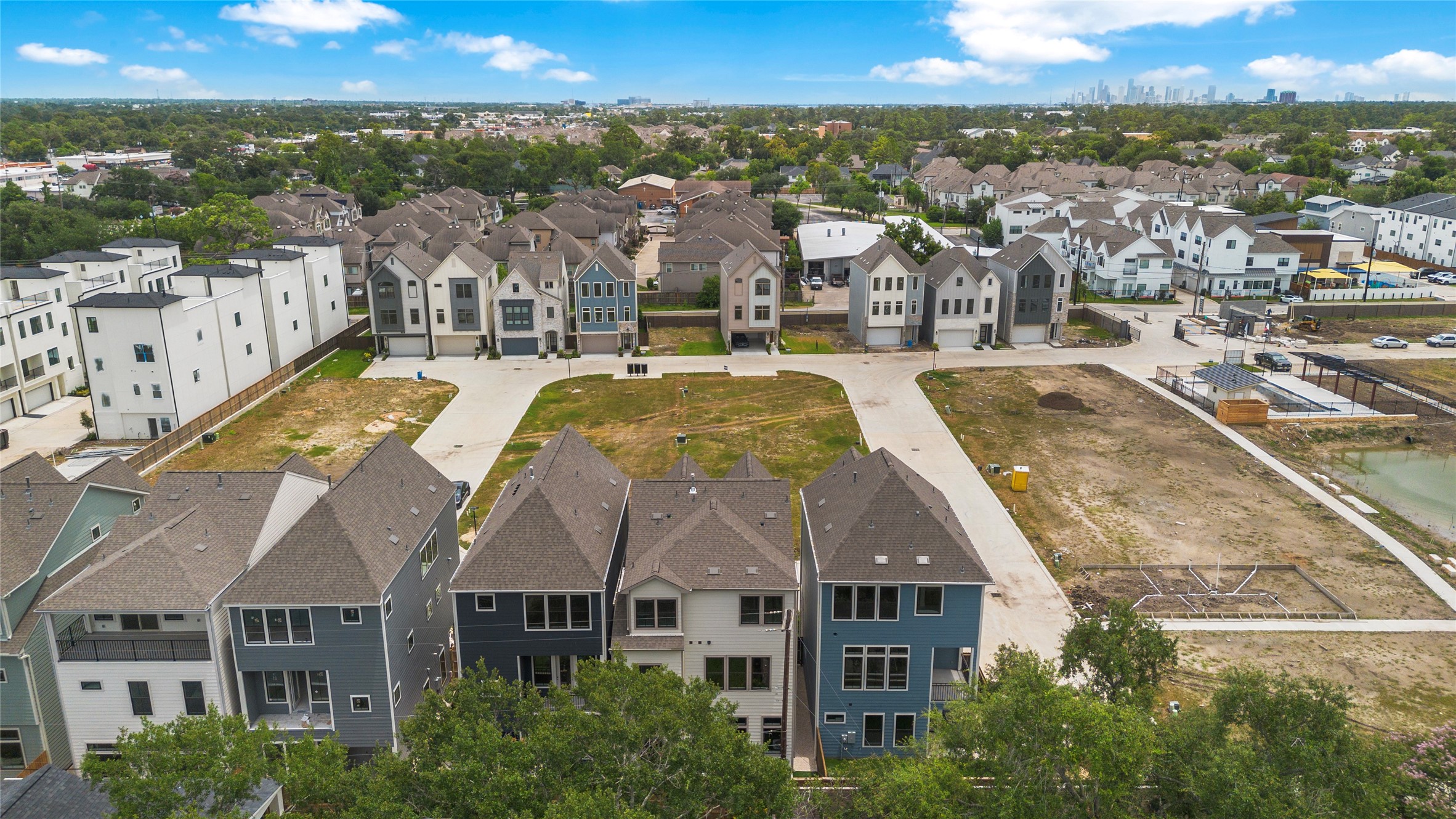 1705 Bologna Lane Houston, TX 77055 - Photo 32 of 43 an aerial view of residential houses with outdoor space and ocean view