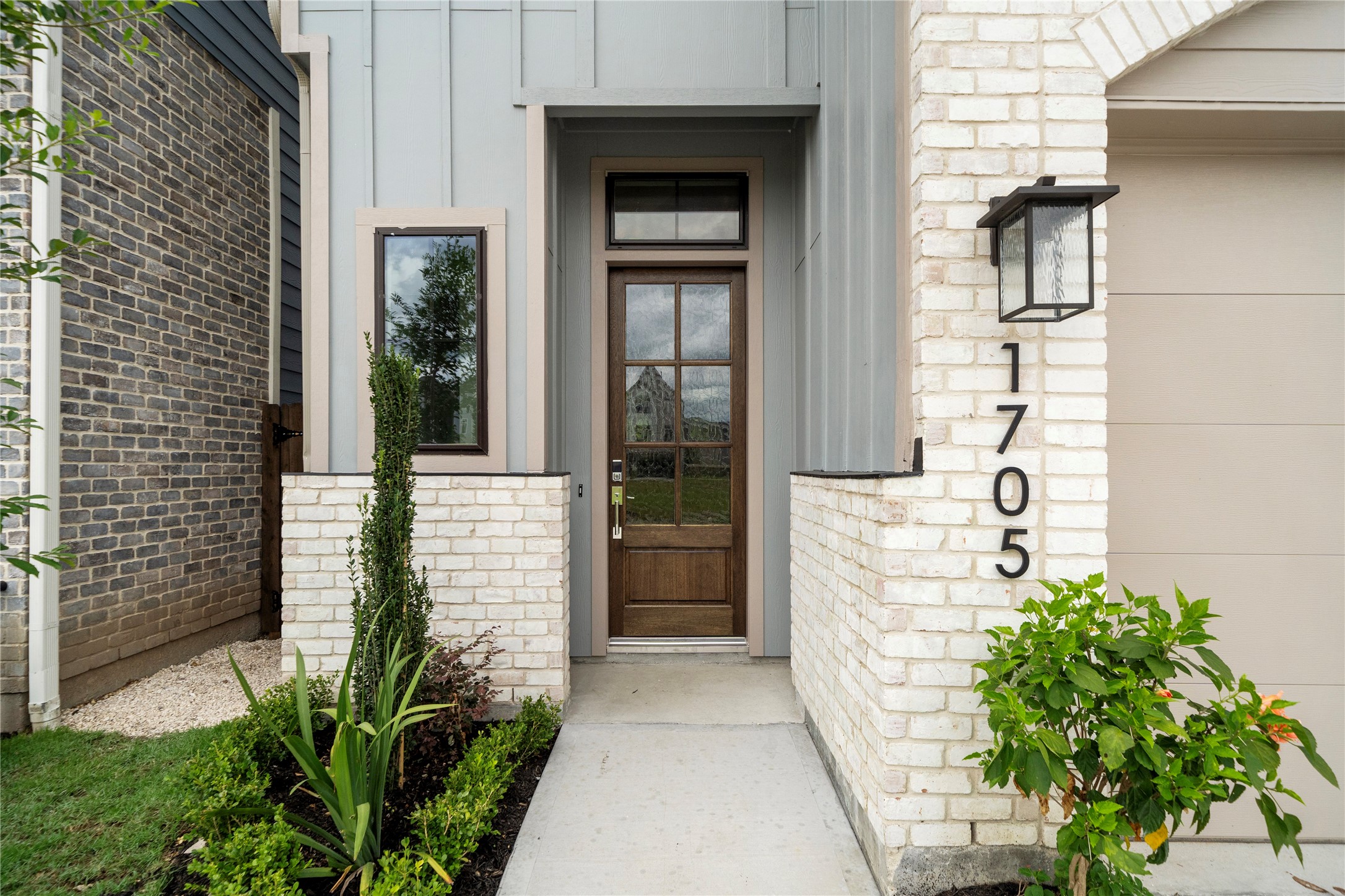 1705 Bologna Lane Houston, TX 77055 - Photo 10 of 43 a yellow house with outdoor space