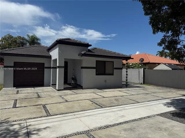 a house view with a outdoor space