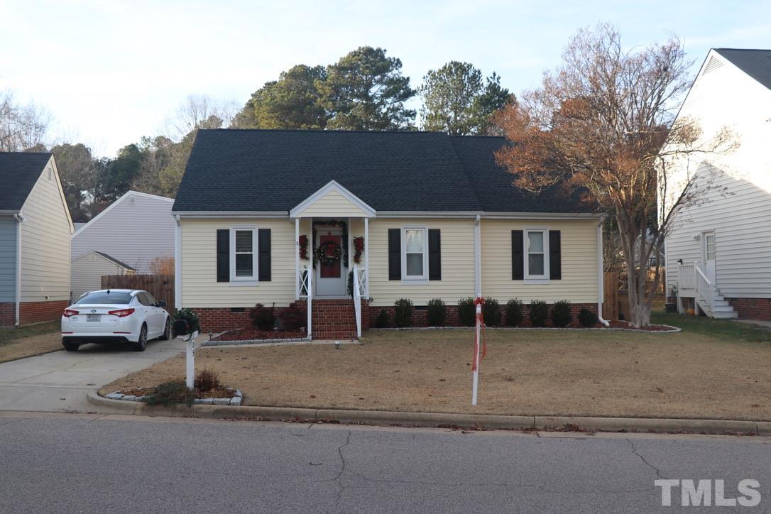 8205 Bellingham Circle Raleigh, NC 27615 - Photo 1 of 16 a car parked in front of white house