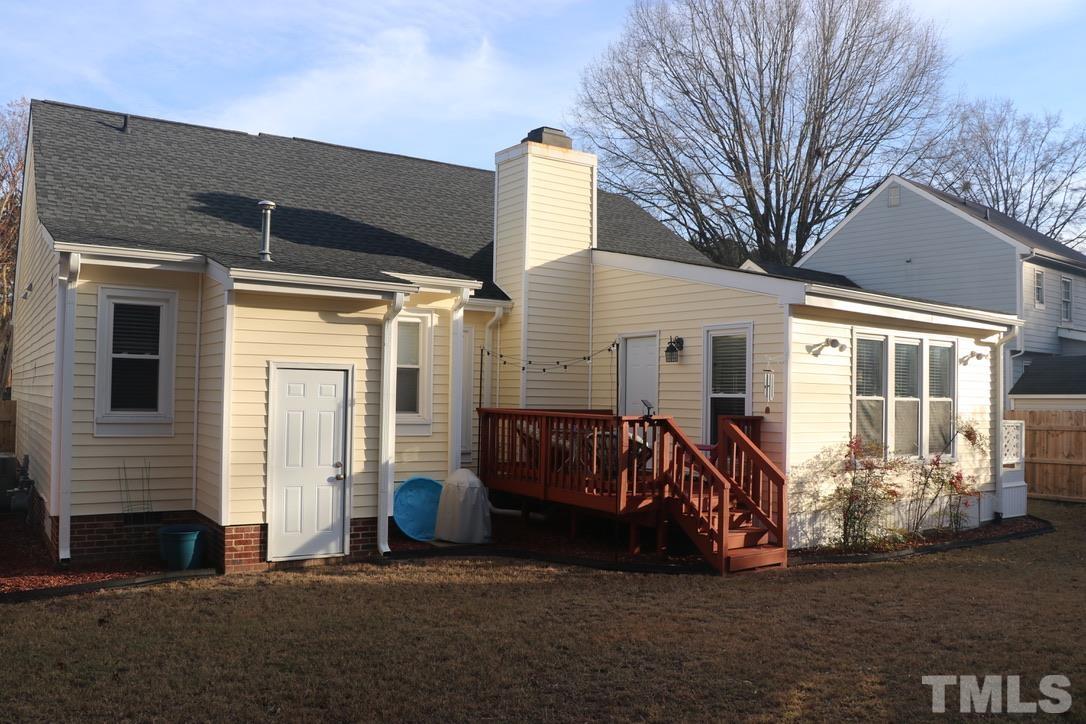 8205 Bellingham Circle Raleigh, NC 27615 - Photo 2 of 16 a view of a house with a patio