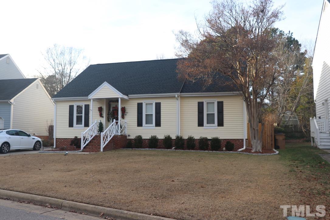 8205 Bellingham Circle Raleigh, NC 27615 - Photo 3 of 16 a view of a house with backyard